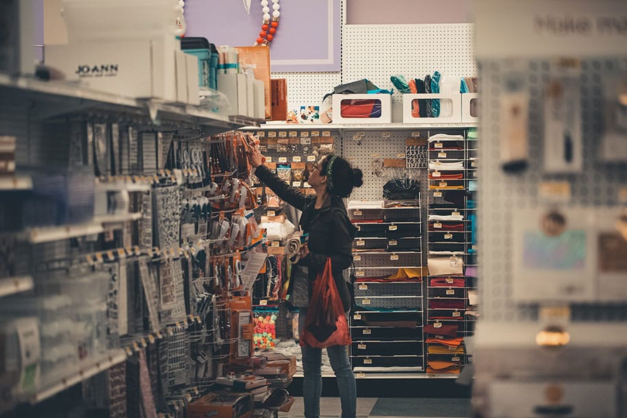 Image of woman shopping in a dollar store