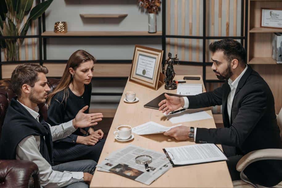 Lawyer and clients consulting in an office